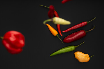 Some pepper on black background