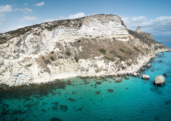 Aerial view of turquoise sea in the little bay in the city of Cagliari (SELLA DEL DIAVOLO) travel destination.
