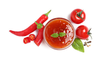 Spicy chili sauce and ingredients on white background, top view