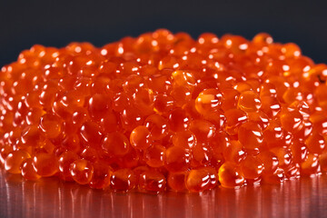 Salmon roe on metal