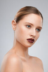 Beautiful lady posing with brown lipstick. Beauty photography