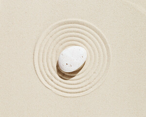 Zen garden meditation sandy background  White stone and lines on sand