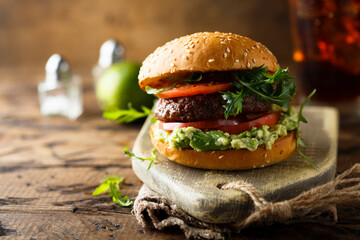 Traditional beef burger with guacamole