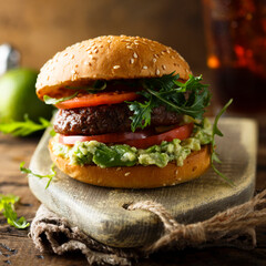 Traditional beef burger with guacamole