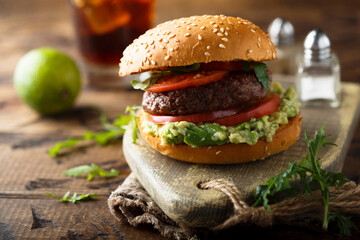 Traditional beef burger with guacamole