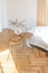 expensive modern light luxury interior design of a spacious living room with wooden elements and white walls. filled with original and unusual decorative things