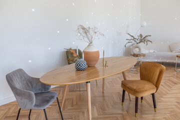 expensive modern light luxury interior design of a spacious living room with wooden elements and white walls. filled with original and unusual decorative things