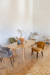 expensive modern light luxury interior design of a spacious living room with wooden elements and white walls. filled with original and unusual decorative things