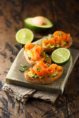 Homemade salmon bruschetta with avocado