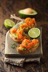 Homemade salmon bruschetta with avocado