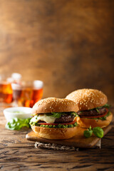 Traditional homemade beef burgers with pesto sauce