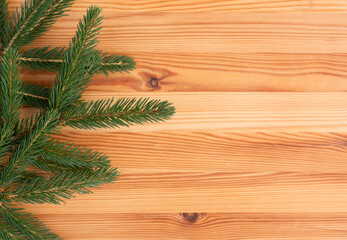 christmas flat lay, fir tree on wooden background top view, free copy space, christmas tree