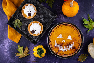 Halloween pumpkin pie in shape of jack-o-lantern