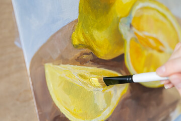 Somebody is painting picture with paintbrush. close up