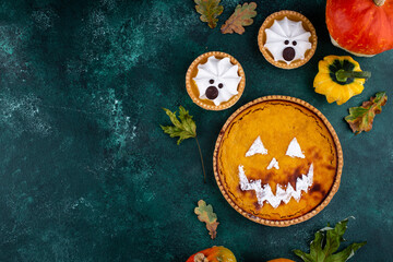 Halloween pumpkin pie in shape of jack-o-lantern