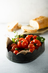 Fresh ripe tomatoes in a box