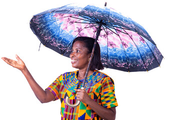 smiling adult woman standing under an umbrella and reach out.