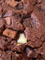 Cookie with chocolate pieces background