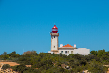 Fototapeta na wymiar Lighthouse Farol de Alfazina, Algarve Portugal