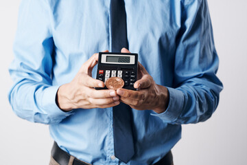 calculator in the hands of a man close-up finance electronic money