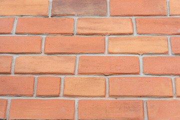 Obraz premium orange brown artificial Brick Foam background at outdoor field.