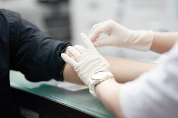 Fototapeta na wymiar doctor draw blood fron vein of patient for test diagnosis