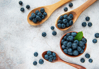 Blueberries on concrete background