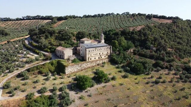 Cano santo convent in Olvera, Cadiz Spain. Old church in middle of landscape in Andalusia, Spain. Drone aerial view. 