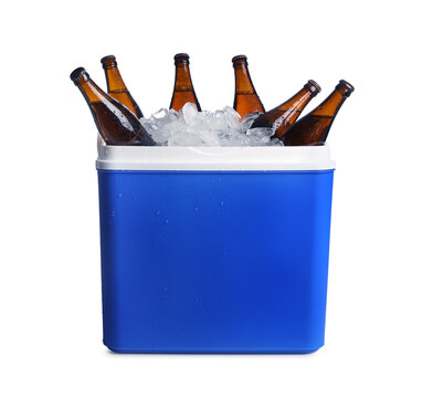 Blue plastic cool box with ice cubes and beer on white background