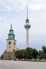 Obraz premium Berlin, Germany. St. Mary's Church (Marienkirche) and Berlin TV Tower (