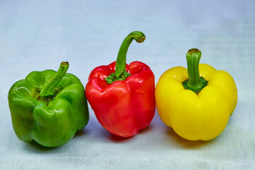 fresh bell peppers on white napkin 