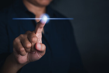 Businessman using finger touching on virtual screen. Futuristic business and IT presentation background. Space for text. Innovation technology computer and business concept © meeboonstudio