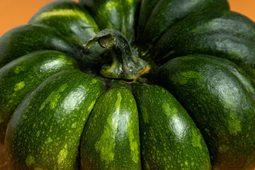 Closeup of texture of green pumkin.Fresh and raw pumkin texture as background