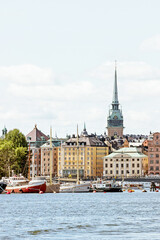 Fototapeta na wymiar old buildings at seaside in old town Stockholm