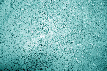 Old stone wall close-up in cyan tone.