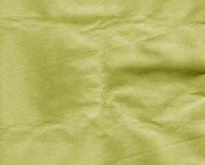 Crafted crumpled paper for background and desing in yellow tone.