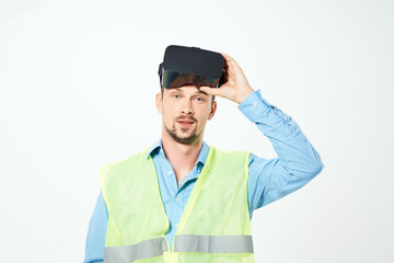 male builder with drawings in hand hand gesture isolated background