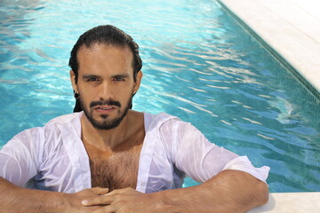Elegant and sensual ethnic wet long haired man