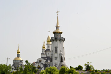 Christian church cross in high steeple tower for prayer