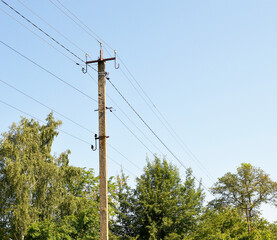 Power electric pole with line wire on colored background close up