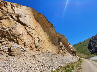 Road next to the rock