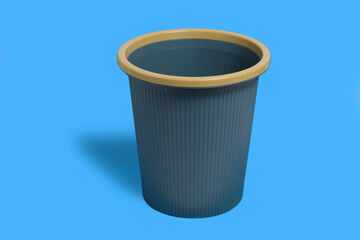 Dark blue garbage bucket on a blue background.