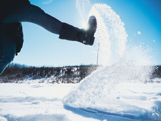 Boot Kicking Snow