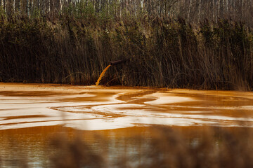 the pipe discharges waste into the water. contamination of the reservoir with dangerous toxic...