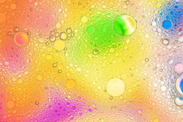 Аbstract image of oil and water bubbles of various colors. Colorful artistic image of oil drop on water for modern and creation design background.