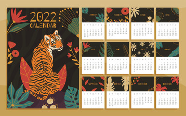 2022 year calendar concept with  hand drawn illustrations of tiger and jungle leaves.