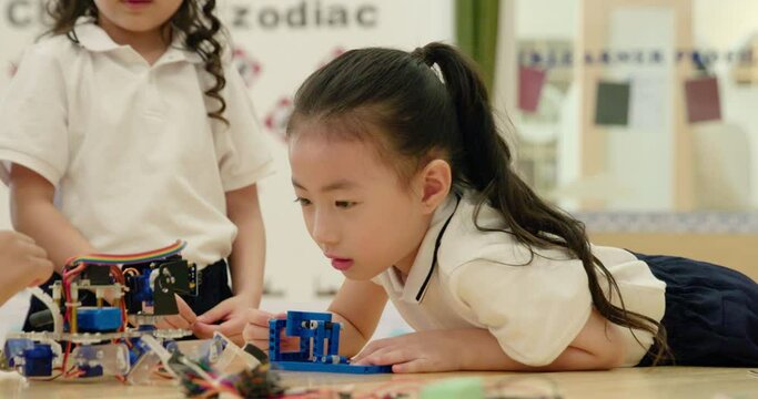 Children learning coding in kindergarten classroom,4K