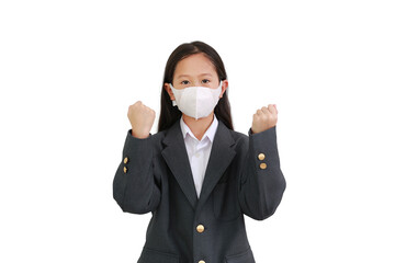 Asian young girl kid wearing formalwear shirt, student suit and protective face mask show fighting gesture isolated on white background during coronavirus and flu outbreak