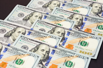 Fototapeta na wymiar Dollar texture of 100, Benjamin Franklin and American cash.