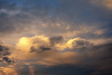 Beautiful clouds at sunset. Close-up. Natural background.